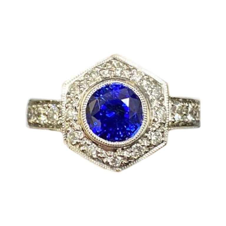 Hand Engraved Platinum 2 Carat Ceylon Blue Sapphire Platinum Halo Diamond Ring For Sale