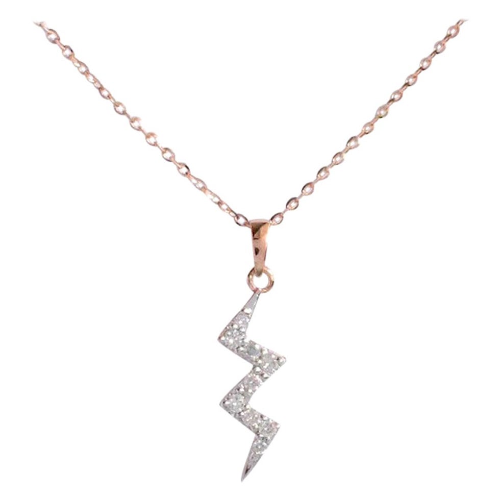 Diamond Thunderbolt Necklace is made of 14k solid gold.
Available in three colors of gold: Rose Gold / White Gold / Yellow Gold.

Natural genuine round cut diamond each diamond is hand selected by me to ensure quality and set by a master setter in