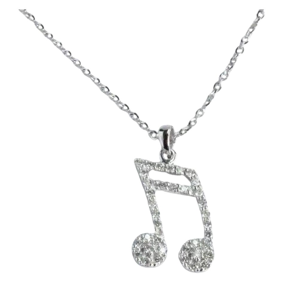 Delicate Dainty Music Note Charm Necklace is made of 18k solid gold.
Available in three colors of gold: White Gold / Rose Gold / Yellow Gold.

Lightweight and gorgeous, these are a great gift for anyone on your list. Perfect for everyday wear or for