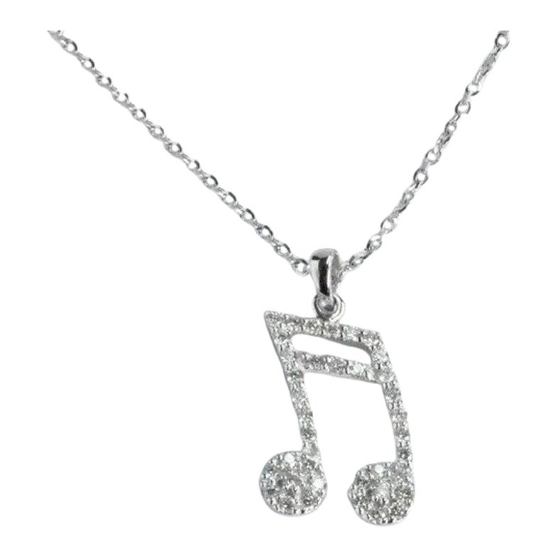 Music Note Charm Necklace is made of 14k solid gold.
Available in three colors of gold: White Gold / Rose Gold / Yellow Gold.

Delicate dainty music note charm necklace with natural diamond set in 14k Gold. This modern minimalist necklace is a