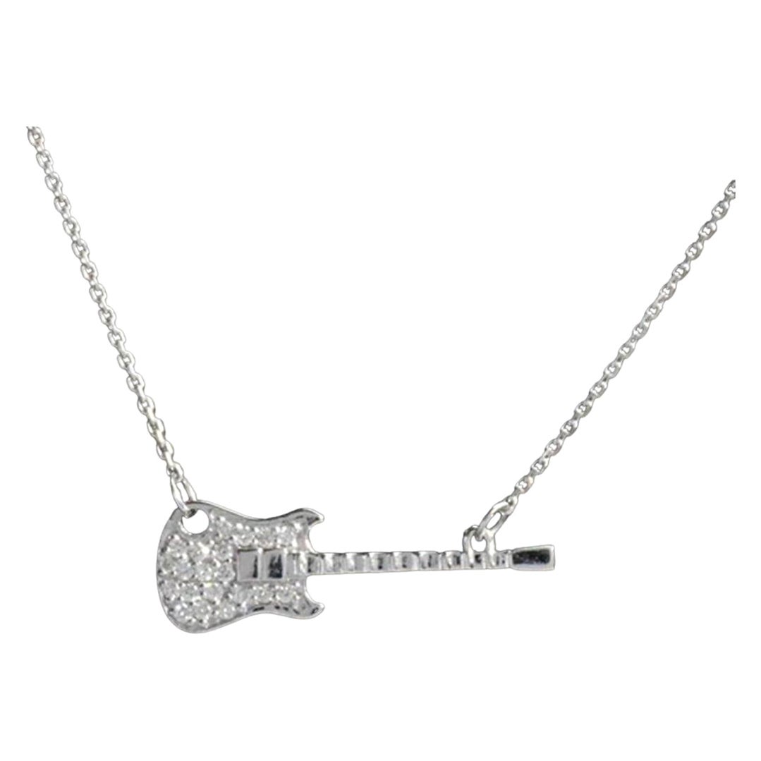 Delicate Dainty Guitar Charm Necklace is made of 18k solid gold.
Available in three colors of gold:  White Gold / Rose Gold / Yellow Gold.

Natural genuine round cut diamond each diamond is hand selected by me to ensure quality and set by a master