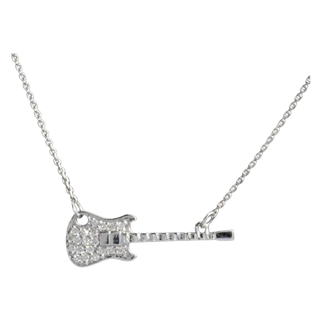 Le délicieux collier à breloques Guitare est fabriqué en or massif 14 carats.
Disponible en trois couleurs d'or : Or blanc / Or rose / Or jaune.

Diamant naturel véritable de taille ronde : chaque diamant est sélectionné à la main par mes soins pour