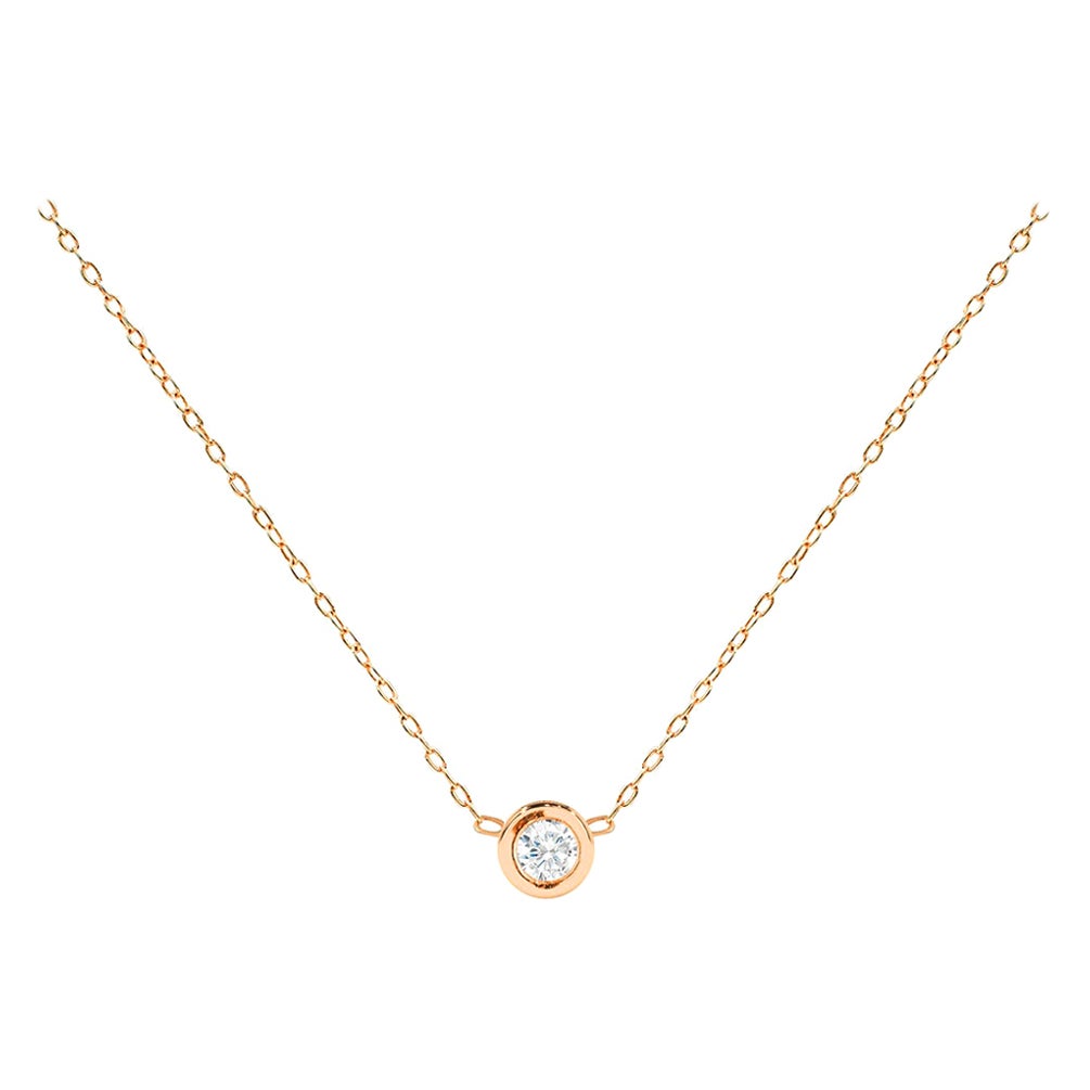  Diamond Solitaire Necklace is made of 18k solid gold available in three colors of gold, White Gold / Rose Gold / Yellow Gold.

Brilliant white sparkly natural diamond bezel set hanging in center of a thin dainty gold chain a perfect choice for