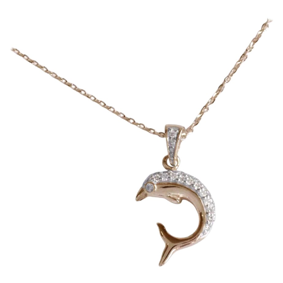 Delicate dainty dolphin charm necklace with a natural diamond is made of 18k solid gold.
Available in three colors of gold: White Gold / Rose  Gold / Yellow Gold.

Lightweight and gorgeous natural genuine round cut diamond. Each diamond is hand