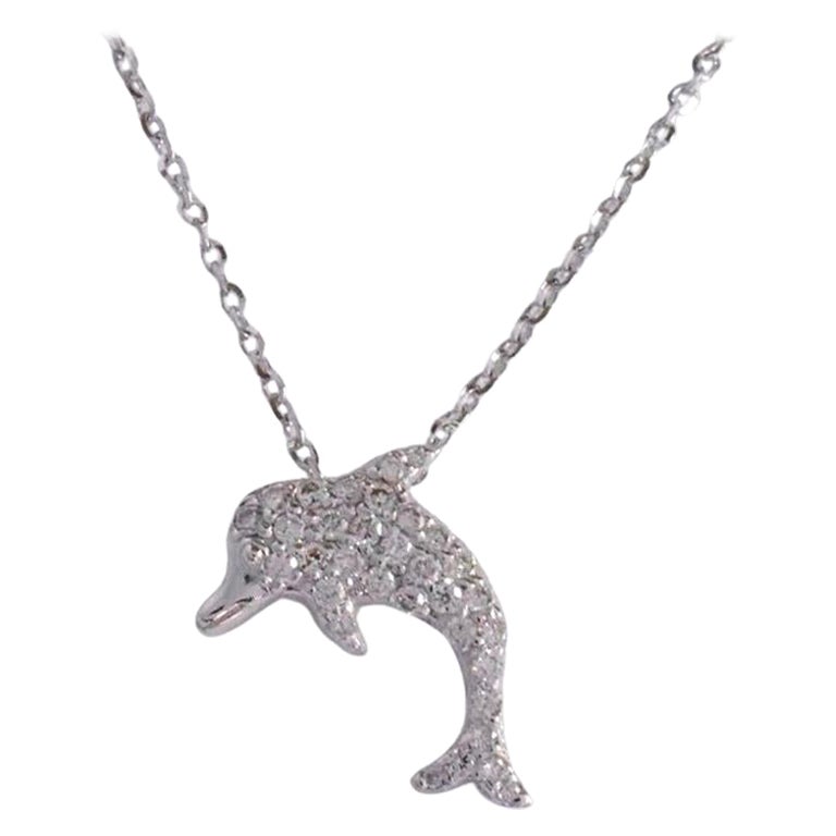 Delicate dainty dolphin charm necklace with natural diamond is made of 14k solid gold.
Available in three colors of gold:  White Gold / Rose Gold / Yellow Gold.

Lightweight and gorgeous natural genuine round cut diamond. Each diamond is hand