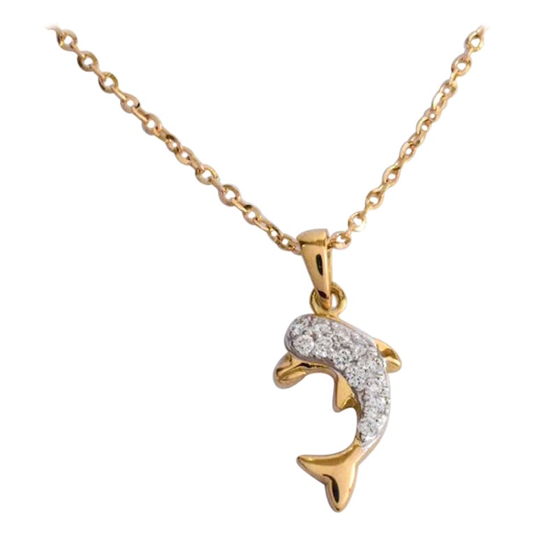 Diamond Dolphin Necklace made of 14k solid gold available in three colors of gold, Rose Gold / White Gold / Yellow Gold.

Natural genuine round cut diamond each diamond is hand selected by me to ensure quality and set by a master setter in our