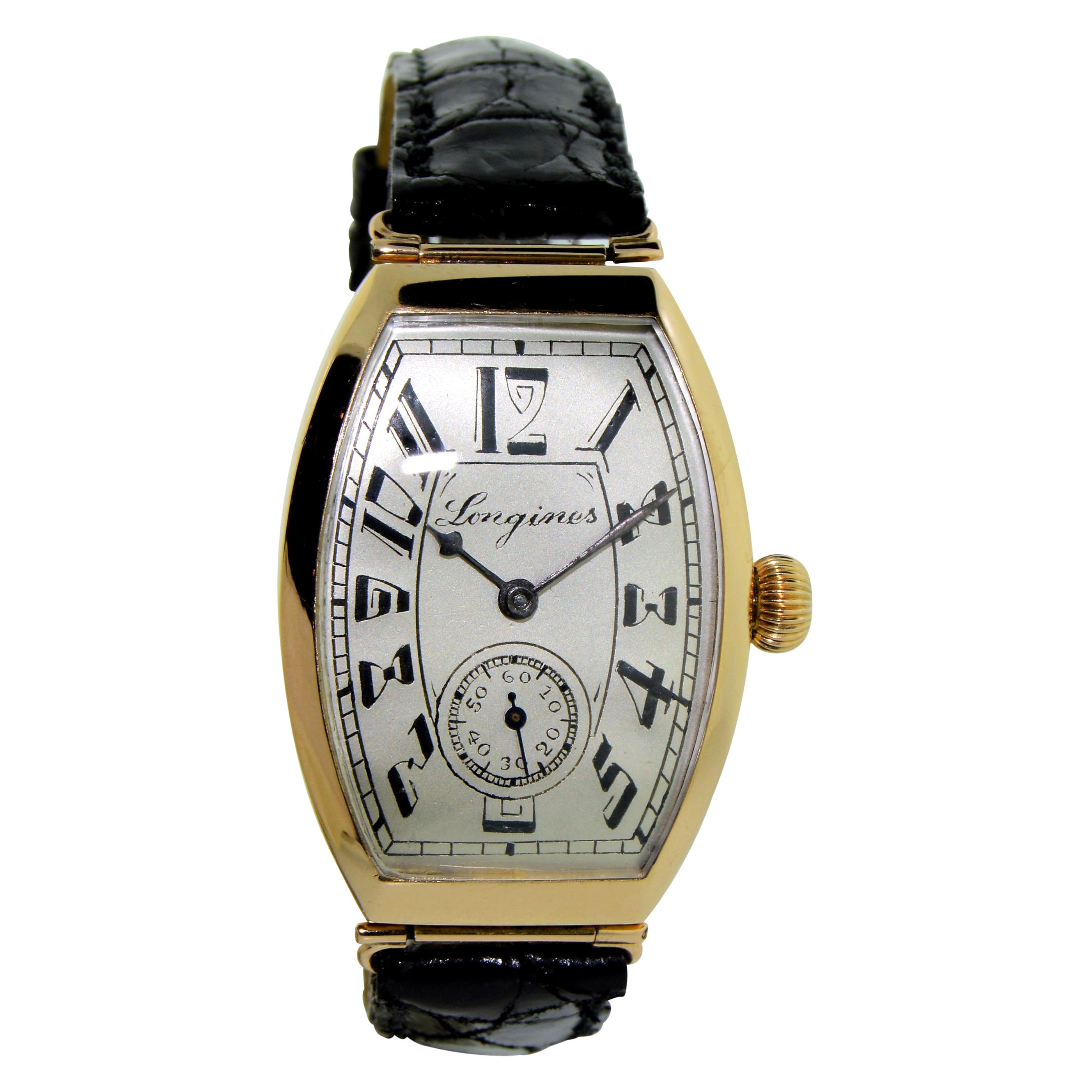 Longines 14 Karat Gold Art Deco Tonneau-Handuhr in Form einer Tonneau-Uhr, um 1920 im Angebot