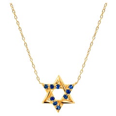 Collier pendentif toile de David en or 14 carats avec saphir bleu et diamant