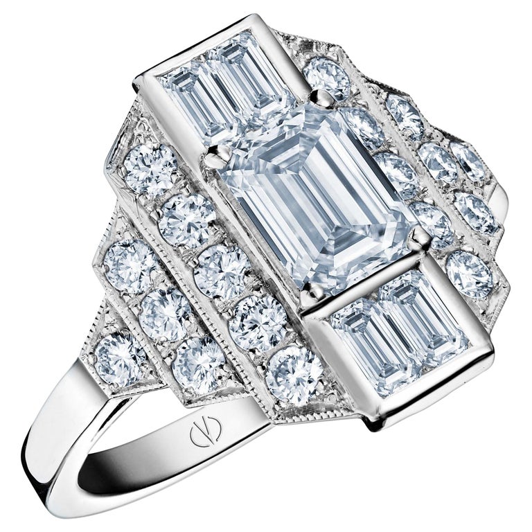 For Sale:  Art Deco Style 18k White Gold 0.70 Ct Emerald Cut Diamond Ring and 4 baguettes