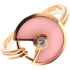 Bague en or avec opale rose et diamant de Cartier Amulette de Cartier