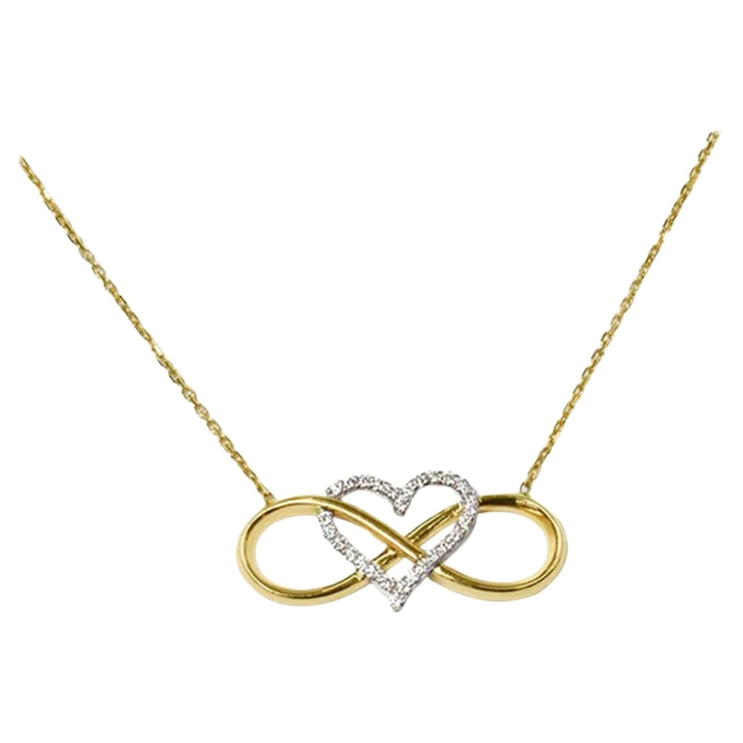 18k Solid Gold Heart Infinity Intertwined Necklace showcasing 28 Brilliant diamonds hang with a thin gold chain.
Available in three colors of gold: White Gold / Rose Gold / Yellow Gold.

Each diamond is hand selected by me to ensure quality. This