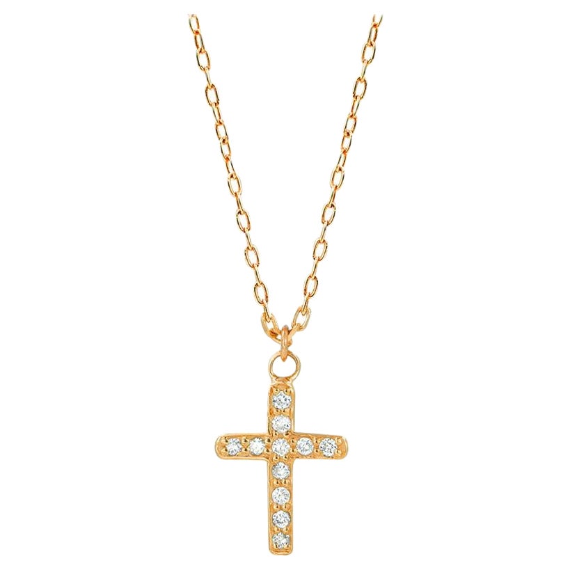 Collier à pendentif croix en or 14 carats et diamants en vente