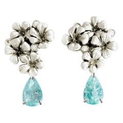 Clous d'oreilles en or blanc avec diamants et tourmalines Paraiba