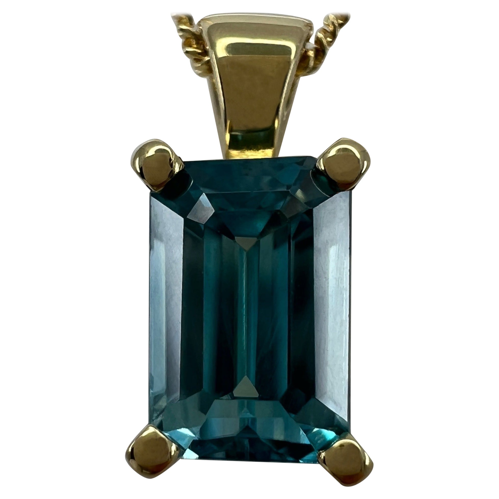 2.45 Carat Vivid Neon Blue Zircon Emerald Cut 18k Yellow Gold Pendant Necklace For Sale