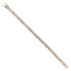 Bracelet tennis en or jaune 18 carats avec diamants taille baguette de 0,15 carat