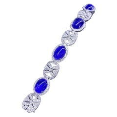 AIG Certified 58.00 Ct Tanzanites 4.90 Ct Diamonds 18K Gold Bracelet