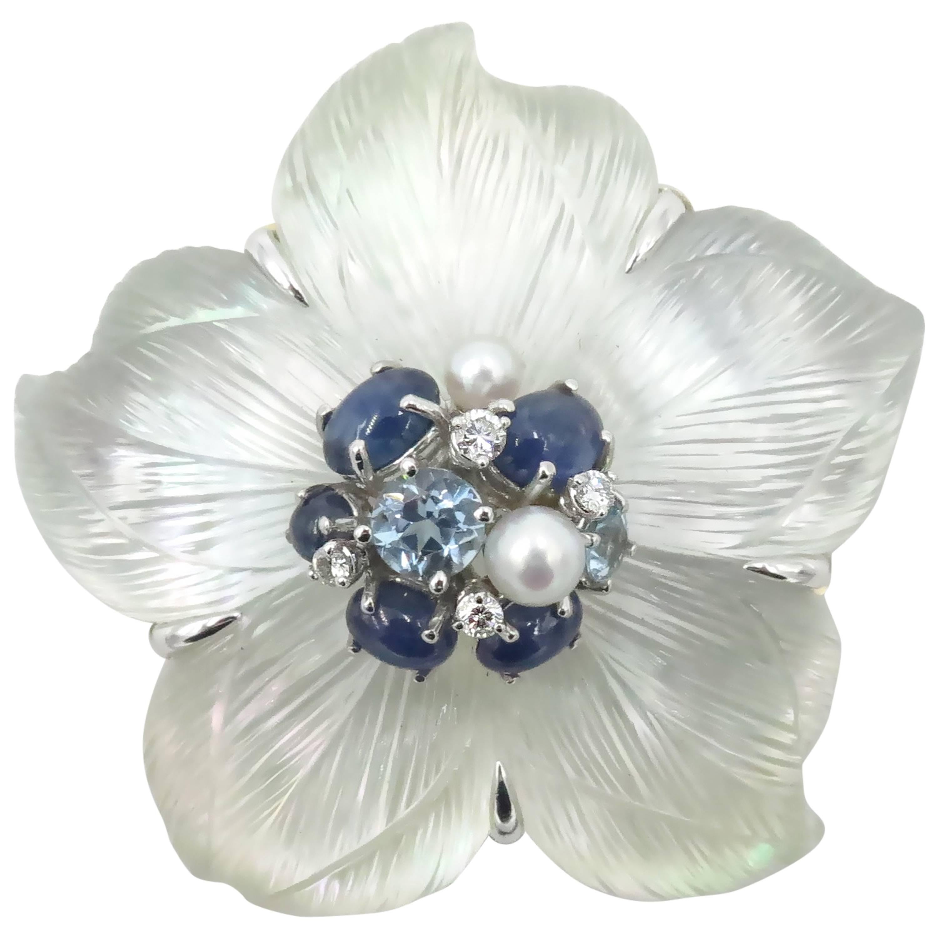 Seaman Schepps Rock Crystal Mother of Pearl Sapphire Diamond Flower Brooch