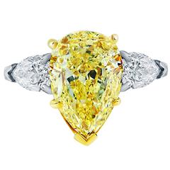 5.93 Carat GIA Cert Three Stone Fancy Yellow Pear Diamond Engagement Ring