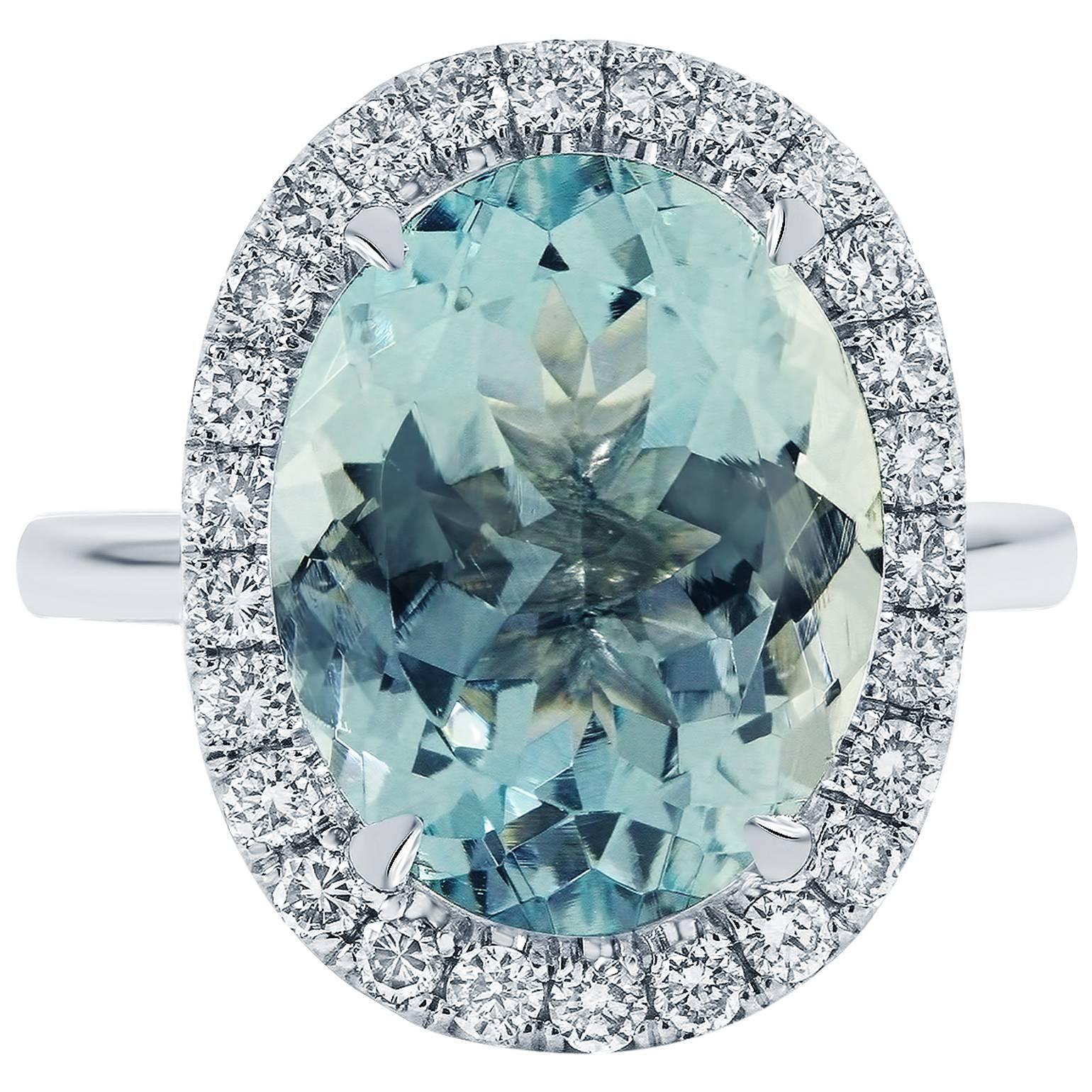6.12 Carat Oval Cut Aquamarine Diamond Halo Platinum Engagement Ring For Sale