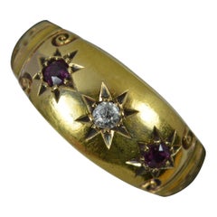 Edwardian 18 Carat Gold Ruby and Diamond Trilogy Gypsy Band Ring