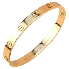Cartier Love Armband aus Roségold mit Papierbearbeitung