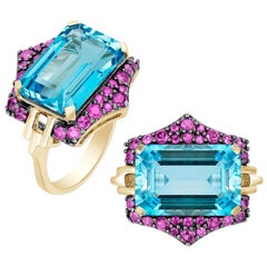 Ring mit blauem Topas im Smaragdschliff und rosa Saphiren von Goshwara
