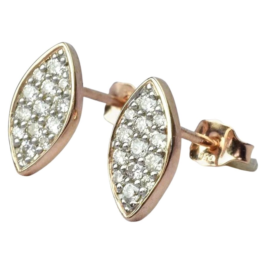 Marquise Diamond Earrings in 14k Rose Gold, Yellow Gold, White Gold.

These Dainty Stud Earrings are made of 14k solid gold featuring shiny brilliant round cut natural diamonds set by master setter in our studio. Simple but unique, elegant and easy