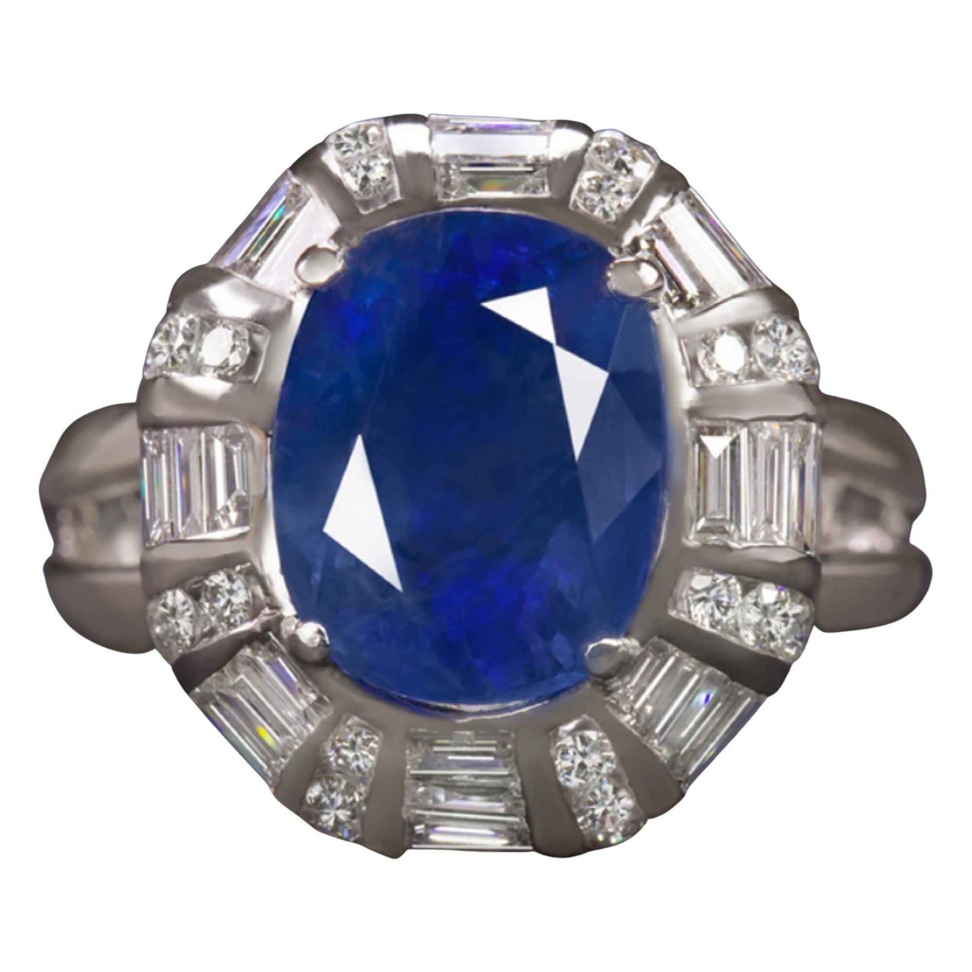 eye-catching and high quality 10.50cttw sapphire and diamond ring truly brings the glamour and the sparkle! The impressively large 6.00ct AGL certified unheated oval sapphire center is surrounded by a shimmering halo of high quality round and