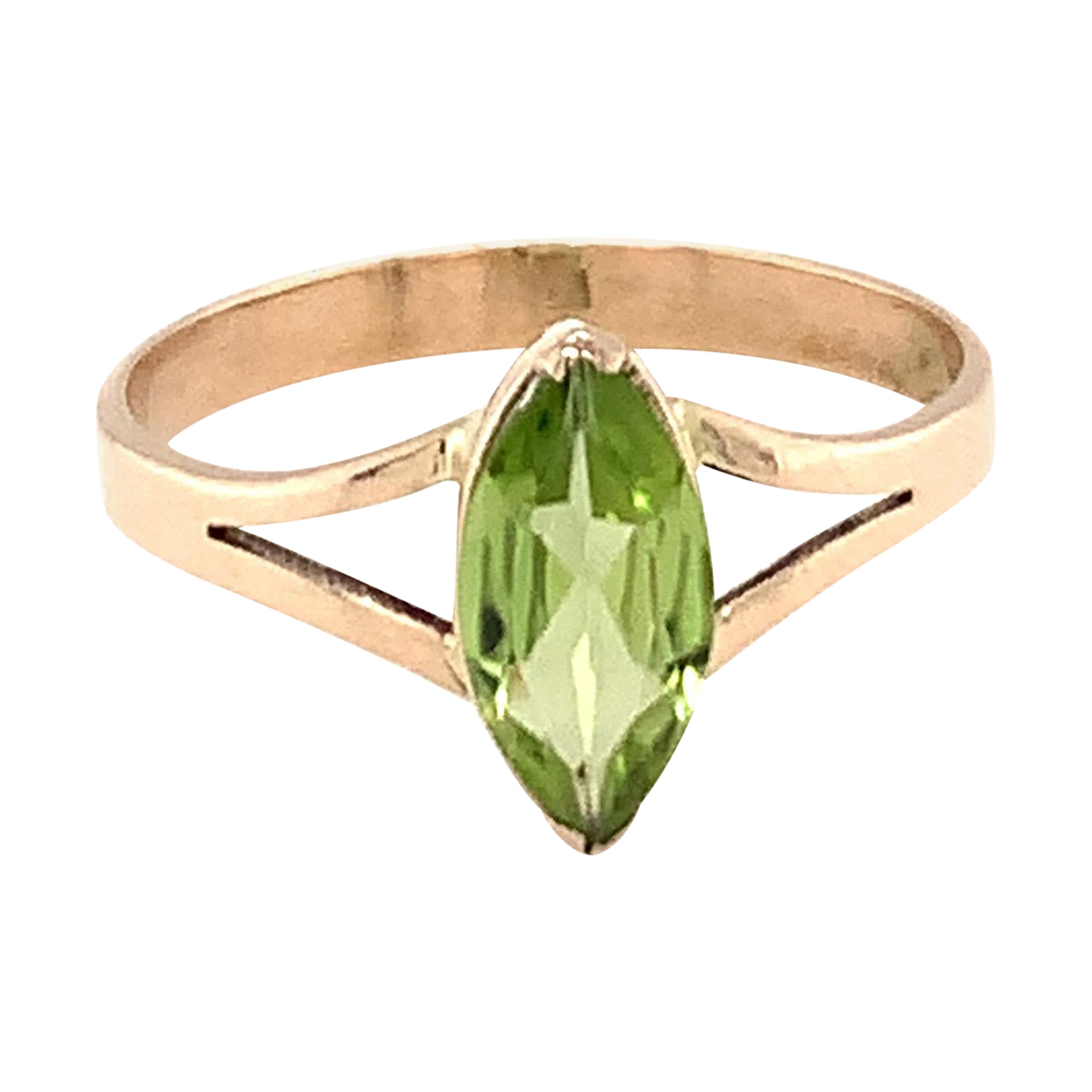 Marquise Cut Peridot Ring Set in 14k Yellow Gold For Sale