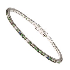 Bracelet tennis en or blanc 18 carats avec diamants de 3/8 carats, saphirs et tsavorites