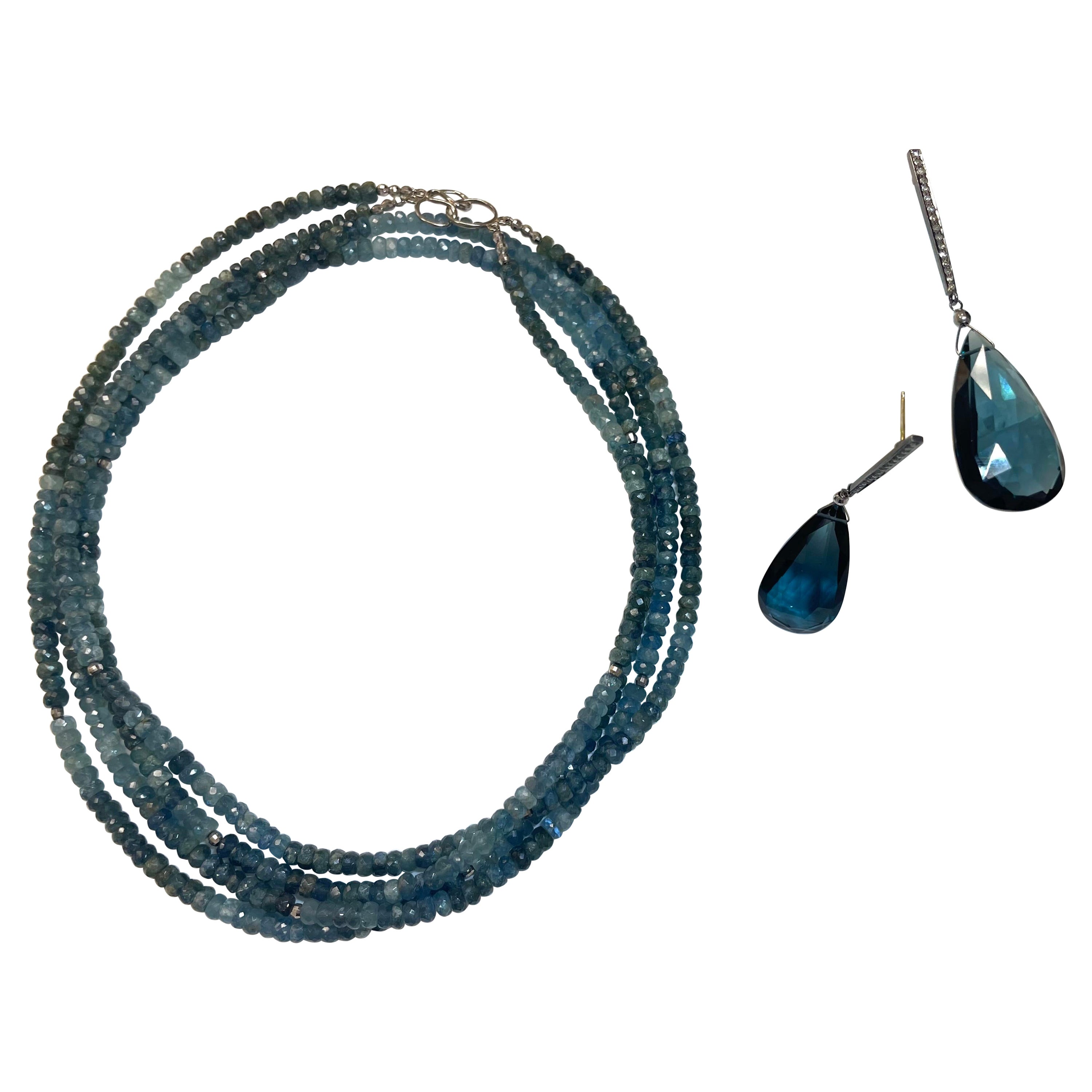 Description
Les magnifiques tons de bleu clair à moyen légèrement opaques créent un effet d'ombre exquis sur ce collier de pierres semi-précieuses aigue-marine Moss peu commun, agrémenté de boules à facettes en or blanc 14k pour ajouter de l'éclat.