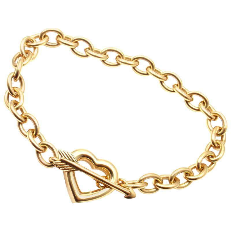 Tiffany and Co. Heart And Arrow Link Toggle Gold Bracelet at 1stDibs ...