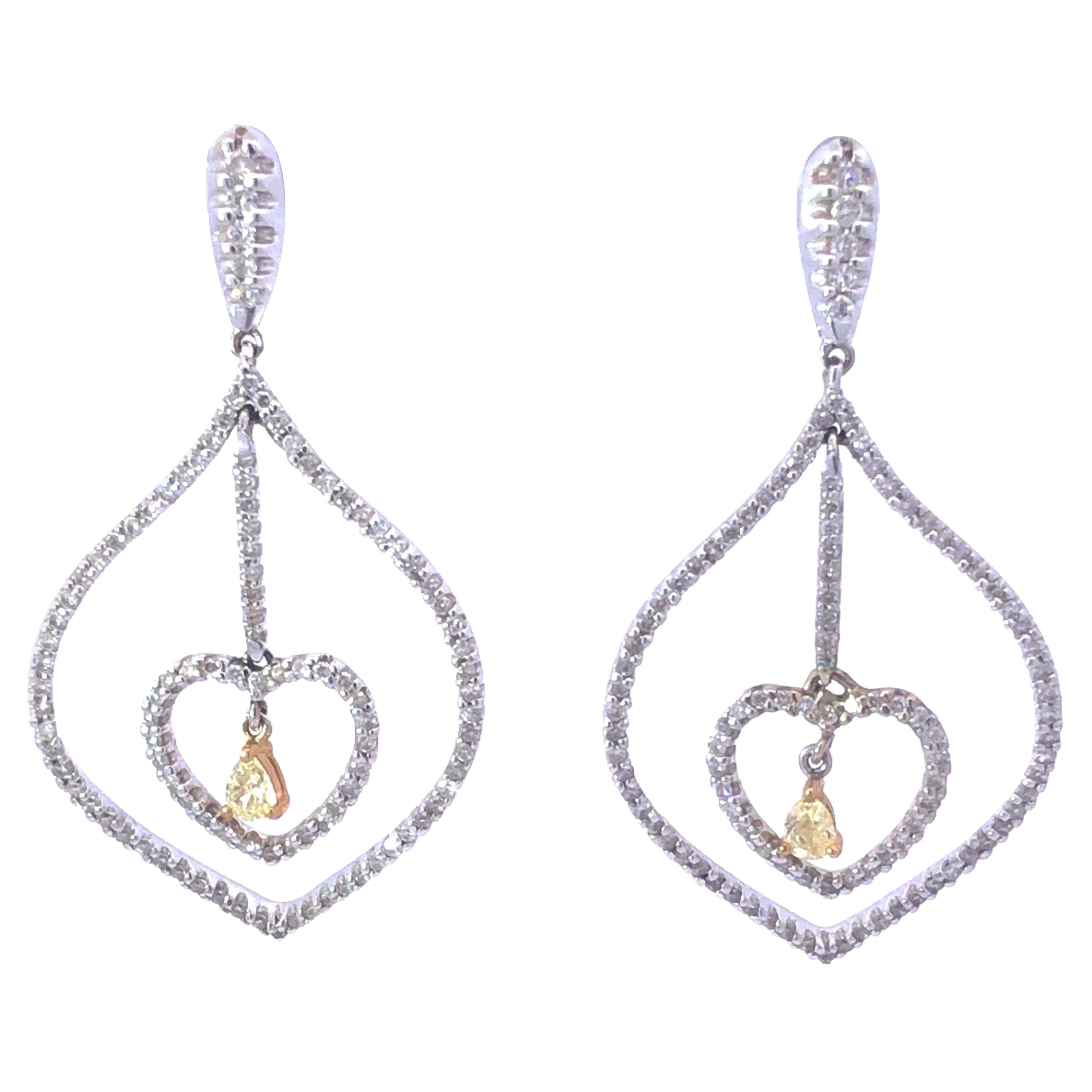 White and Fancy Yellow Dangly Diamond Heart Earrings in 18K White Gold