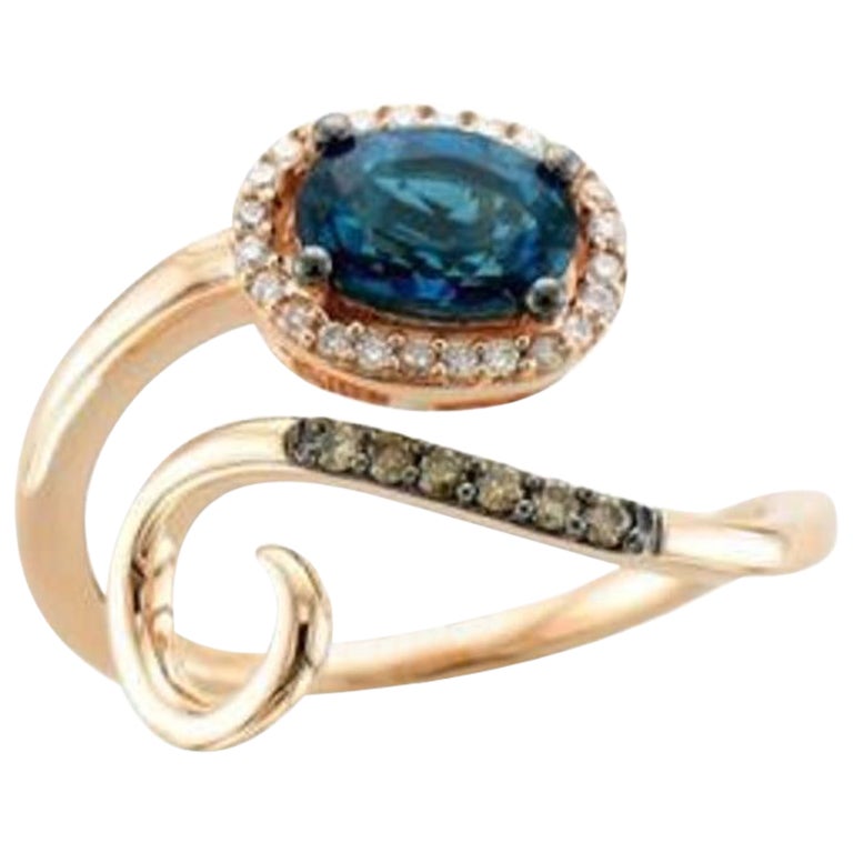 Chocolatier Ring Featuring 7/8 Cts. Deep Sea Blue Topaz, 1/20 Cts