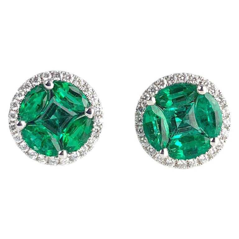 1.28 Carat Emerald and 0.23 Carat Diamond Stud Earrings in 18 Karat White Gold For Sale