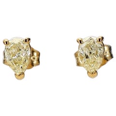 Natural Yellow Pear Diamond .84 Carat TW Yellow Gold Stud Earrings