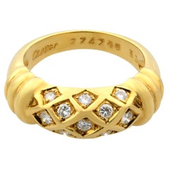 Anello vintage con diamante Cartier in oro giallo 18 carati da 0,20 ct.