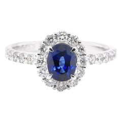 1.00 Carat Natural Sapphire and Diamond Halo Ring Set in Platinum