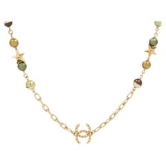 Chanel CC Logo Star Goldton Olive Brown Perlen lange Halskette