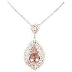 Magnifique collier pendentif en or blanc 18 carats avec morganite rose de 17 carats et diamants