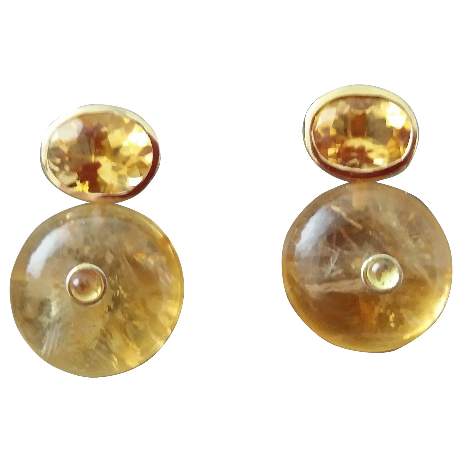 Clous d'oreilles en or 14 carats avec citrine ovale facettée et saphir jaune en forme de roue en vente