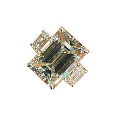 8.10 Carat Emerald Cut Diamond Three Stone Engagement Ring