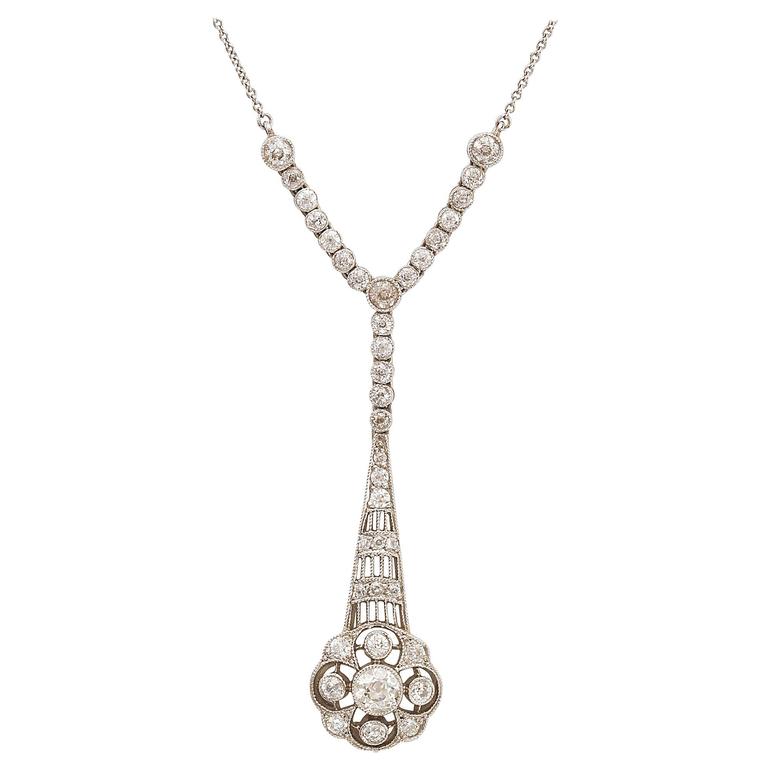 Diamond Platinum Floral Cluster Drop Pendant For Sale