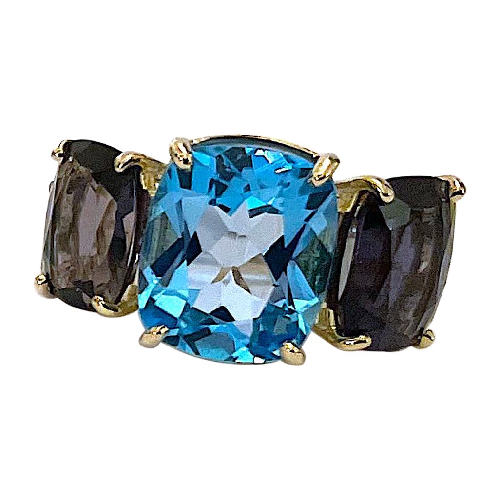 Elegant Three-Stone Blue Topaz and Iolite Ring