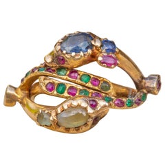 Rare bague en or d'Inde du XIXe siècle à deux têtes de serpent, saphir et émeraude