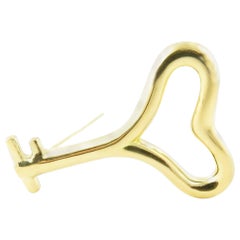 1993 Angela Cummings 18 Karat Yellow Gold Heart Key Pin Brooch