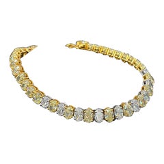 19.84 Carat Oval Shaped Yellow and White Diamond Tennis Bracelet