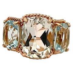Rose Gold Three-Stone Green Amethyst and Blue Topaz Ring with Rope Twist Border