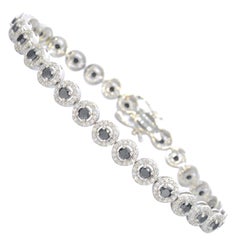 Bracelet en or blanc avec diamants et fleurons de 5,80 carats