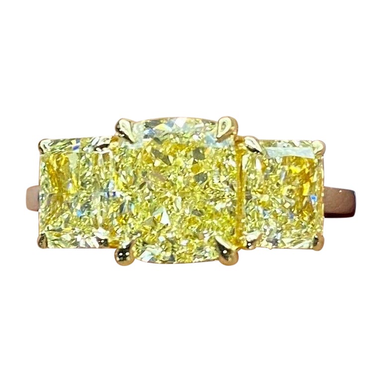 Certified 4.51 Carat Cushion Yellow Diamond Three Stone Engagement Ring
